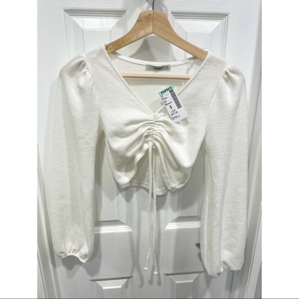 Cropped white long sleeve sweater